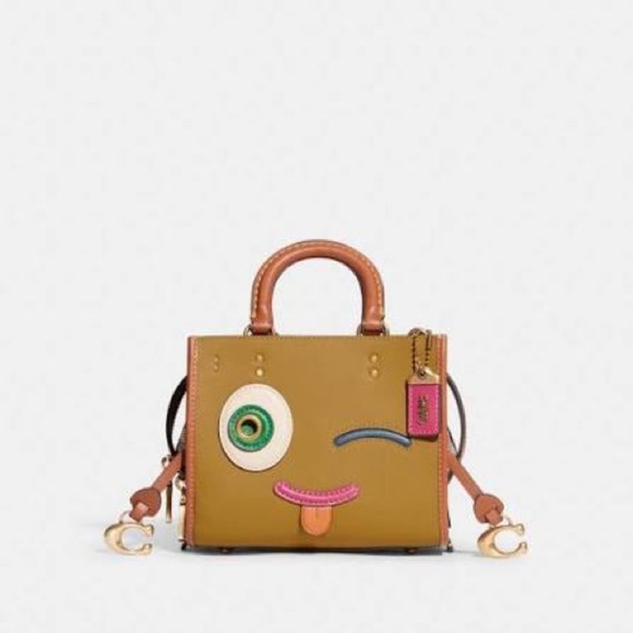 Coach Handbags - RARE Coach Coachies Rogue 17 In Signature Textile Jacquard With Winkie EUC